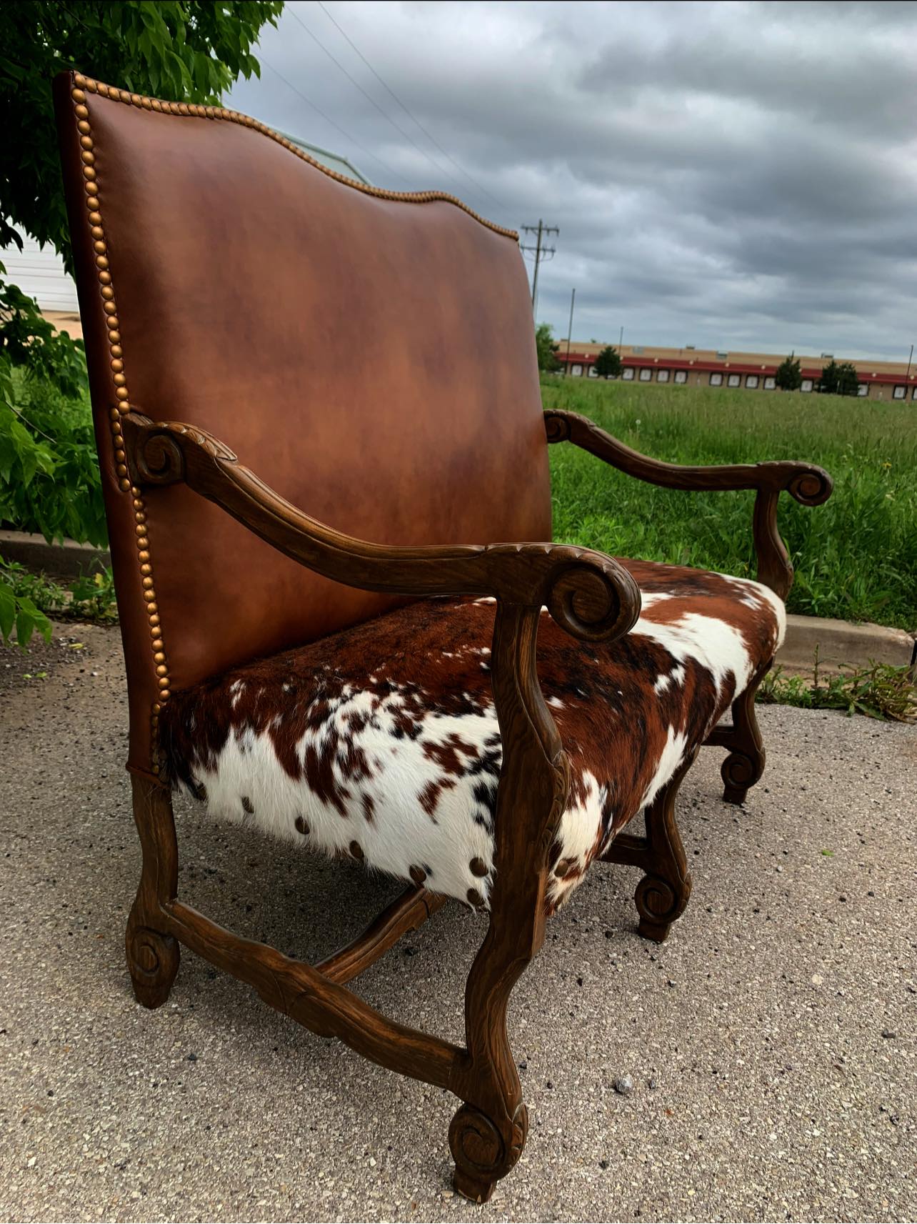 Smooth brown leather and tri color cowhide Regency settee made in the USA - Your Western Decor