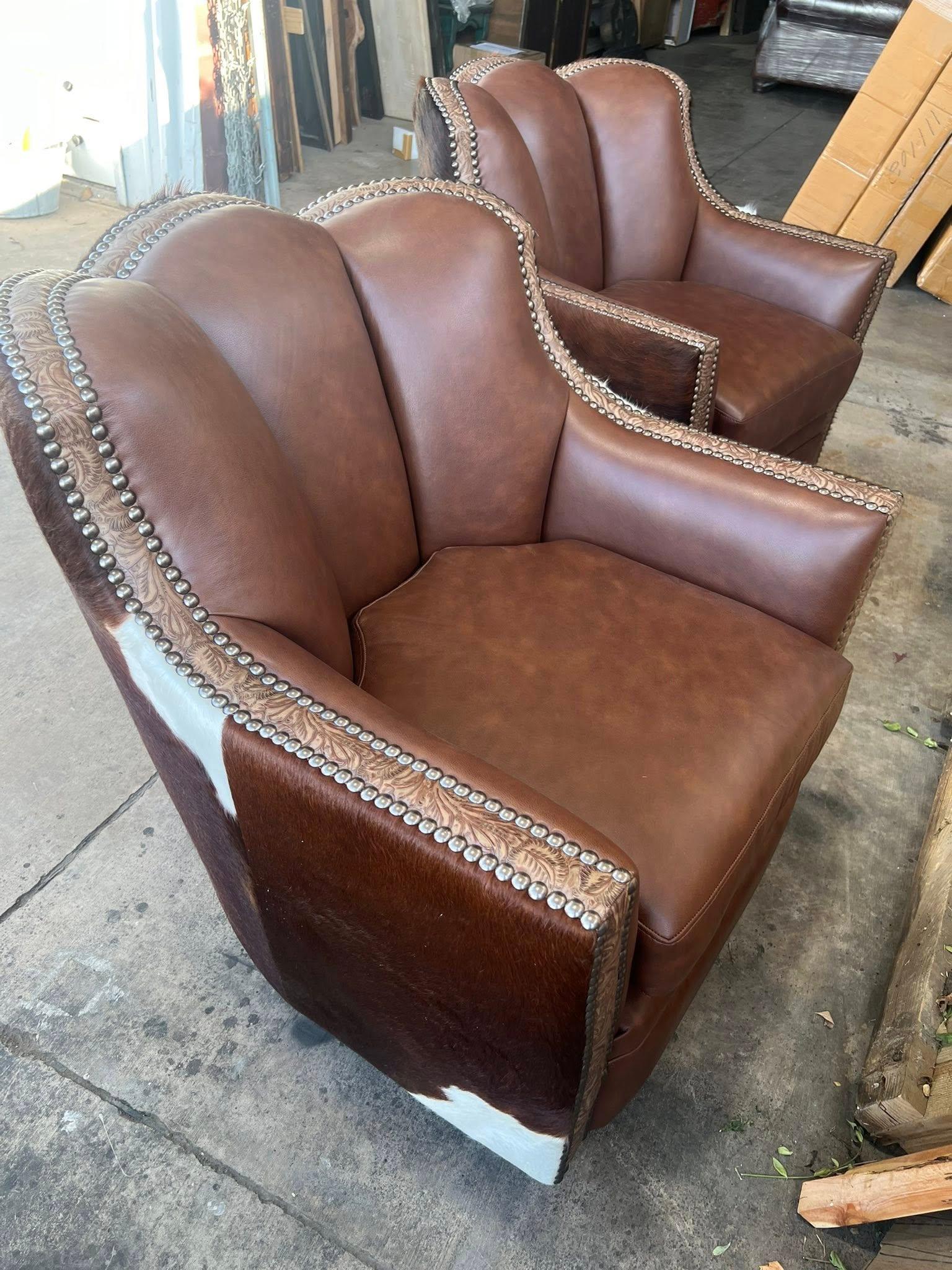Custom leather and cowhide swivel glider chairs - Your Western Decor