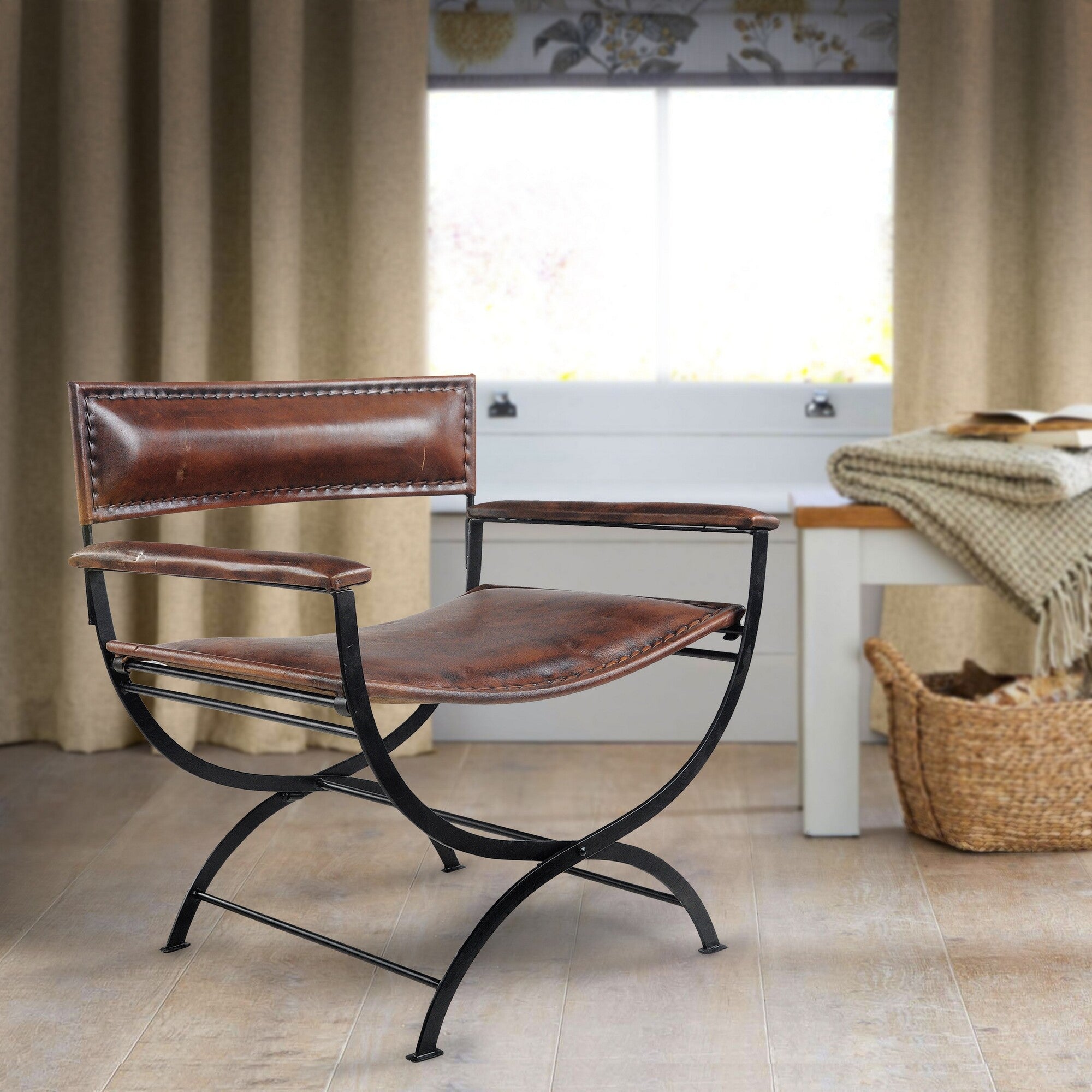 brown leather and black iron directors chair