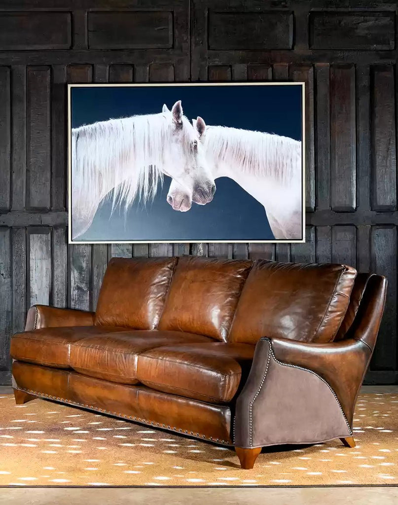 Dark Brown Two Tone Leather Rancher Western Sofa on Axis Hide Rug and White Horse Art - Your Western Decor
