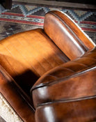 Leather & Shearling Swivel Chair with burnished leather - Your Western Decor