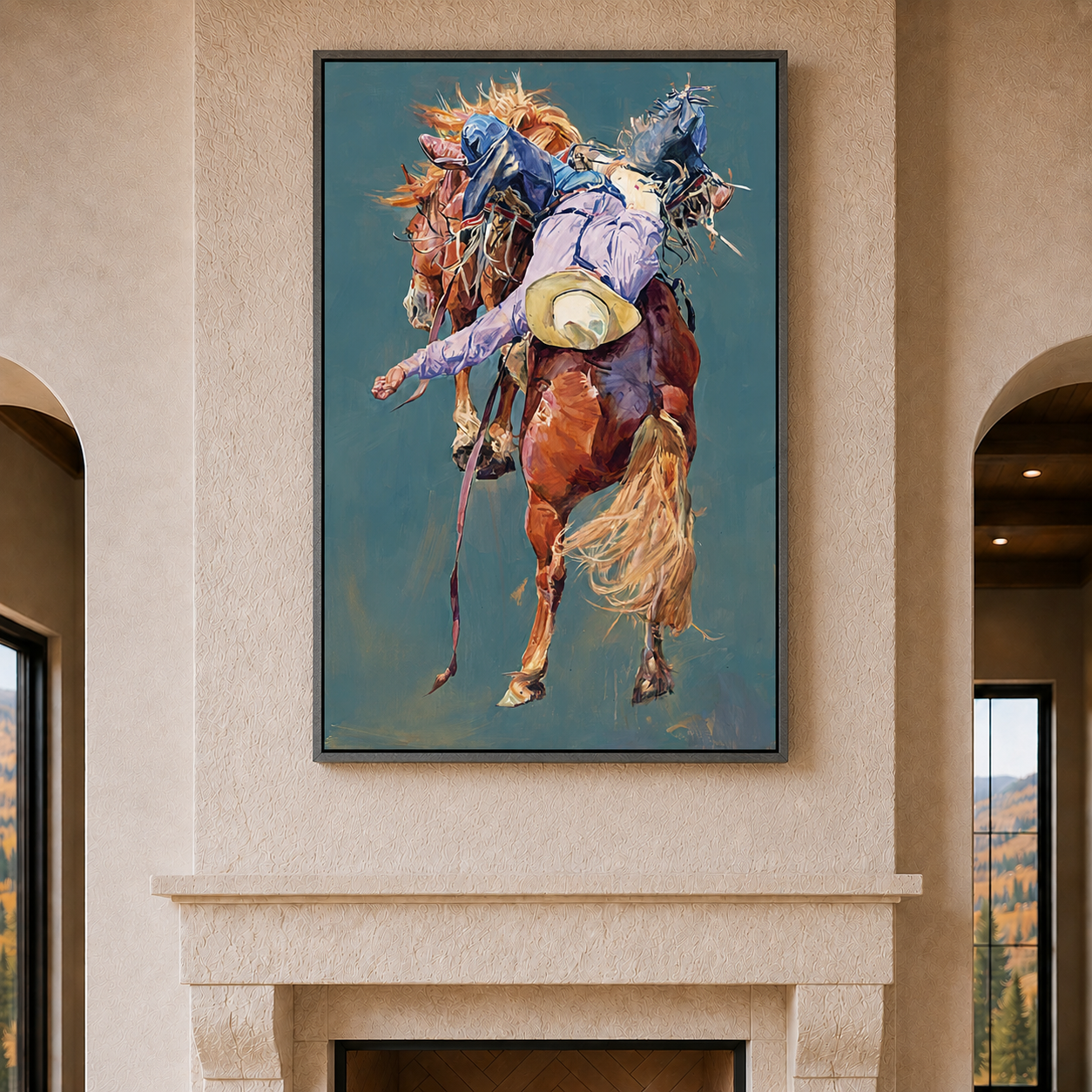 A framed vertical canvas painting of a cowboy riding a bucking horse, displayed on a beige stone wall above a fireplace in a home interior.