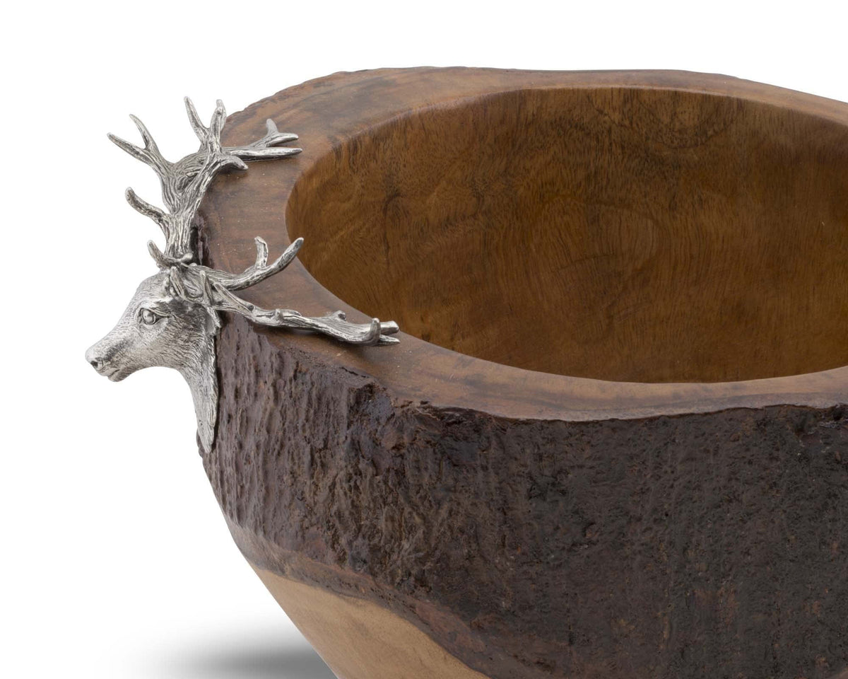 Wooden bowl with a pewter elk head on a white background