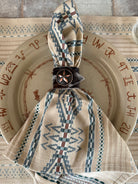 Lonestar concho and cowhide napkin ring on Pendleton napkin - Your Western Decor