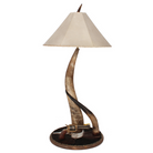 Tall table lamp made with 2 longhorn steer horns with pistol on cowhide base - Your Western Decor