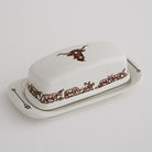 Longhorn Western butter dish with Till Goodan cattle-drive artwork in brown on warm white china