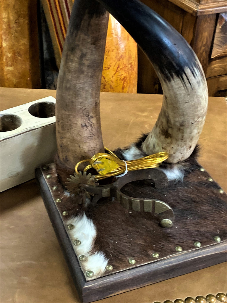 Steer horn western table lamp base detail with cowhide and spur made in the USA - Your Western Decor