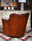 Burgundy brown leather and black cowhide luxury swivel chair made in the USA - Your Western Decor