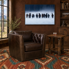 Dark brown leather tufted swivel chair with canvas horse art and nothwoods side table