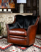 Burgundy brown leather and black cowhide luxury swivel chair made in the USA - Your Western Decor