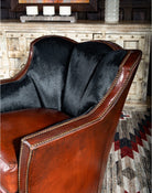 Burgundy brown leather and black cowhide luxury swivel chair made in the USA - Your Western Decor