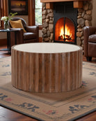 Wooden coffee table in a cozy living room with a fireplace - Your Western Decor