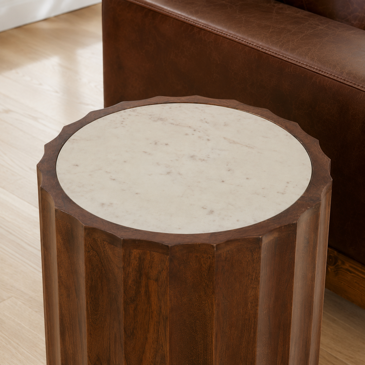White marble tabletop inset within a scalloped mango wood rim