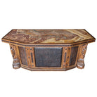 Western desk with wood carvings, tooled leather panels, marble top, and iron with clavos accents - Your Western Decor