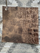 Sample of matte brown gator embossed leather 