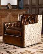 Rustic leather swivel chair with burnished tufted leather and mesa fabric wrap around made in the USA - Your Western Decor