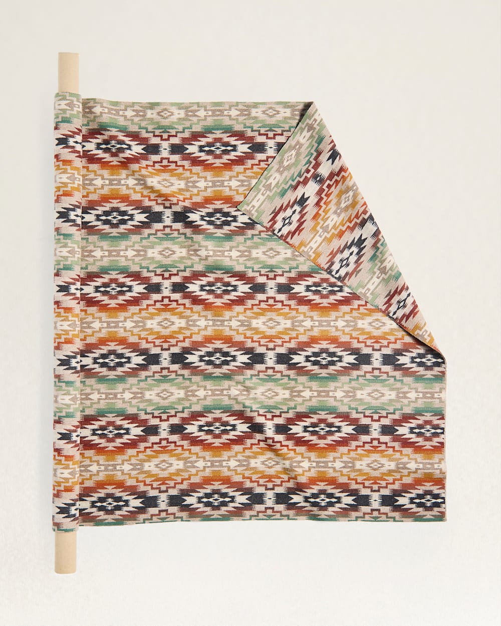 Pendleton Mesilla southwestern wool fabric with geometric diamond pattern in clay, sage green, ivory, and black, blanket-weight jacquard upholstery fabric