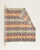 Pendleton Mesilla southwestern wool fabric with geometric diamond pattern in clay, sage green, ivory, and black, blanket-weight jacquard upholstery fabric
