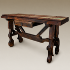 side view of rustic Spanish style old door entry table with center drawer 