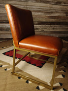 Caramel leather dining chair side with brass metal frame - Your Western Decor
