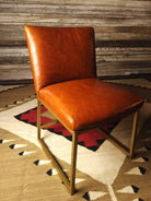 Caramel leather dining chair with brass metal frame - Your Western Decor