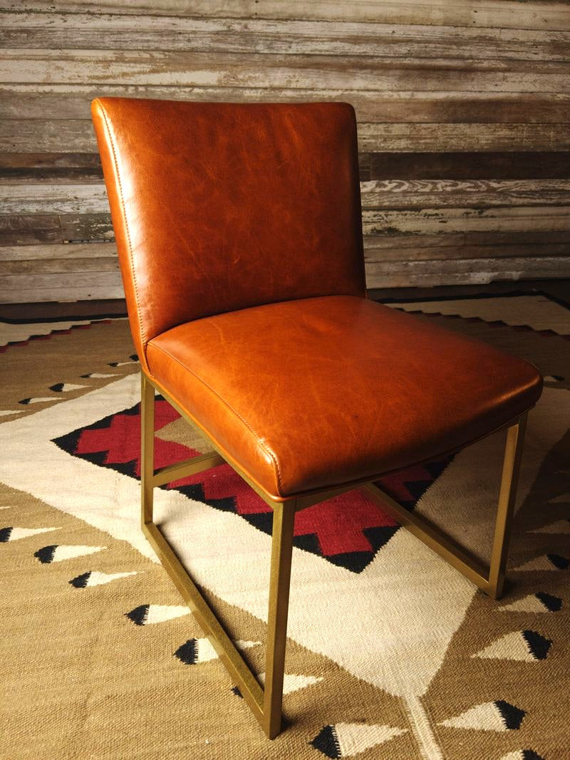 Caramel leather dining chair with brass metal frame - Your Western Decor