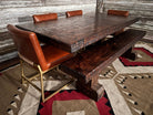 Morris leather dining chairs at Knotty Alder dining table with bench - Your Western Decor