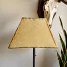Natural rawhide lamp shade, rectangle with rawhide whip-stitching and veining detail 