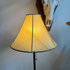 Natural 16 inch round rawhide lamp shade with light on