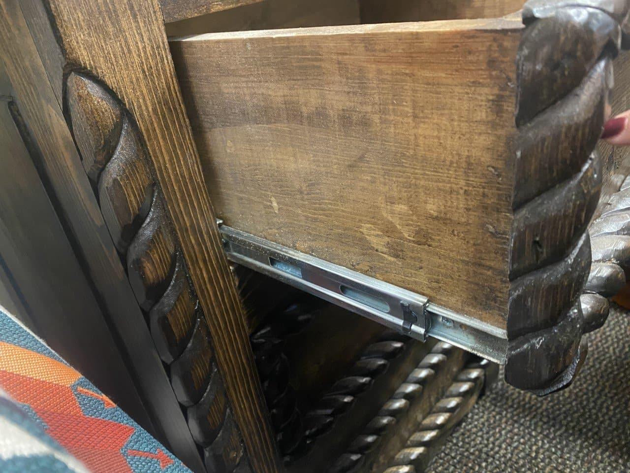 Detail of desk rope trim and drawer glides 