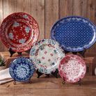 Paisley Bandana Western melamine dinnerware set with red, cream, and blue floral and paisley patterns