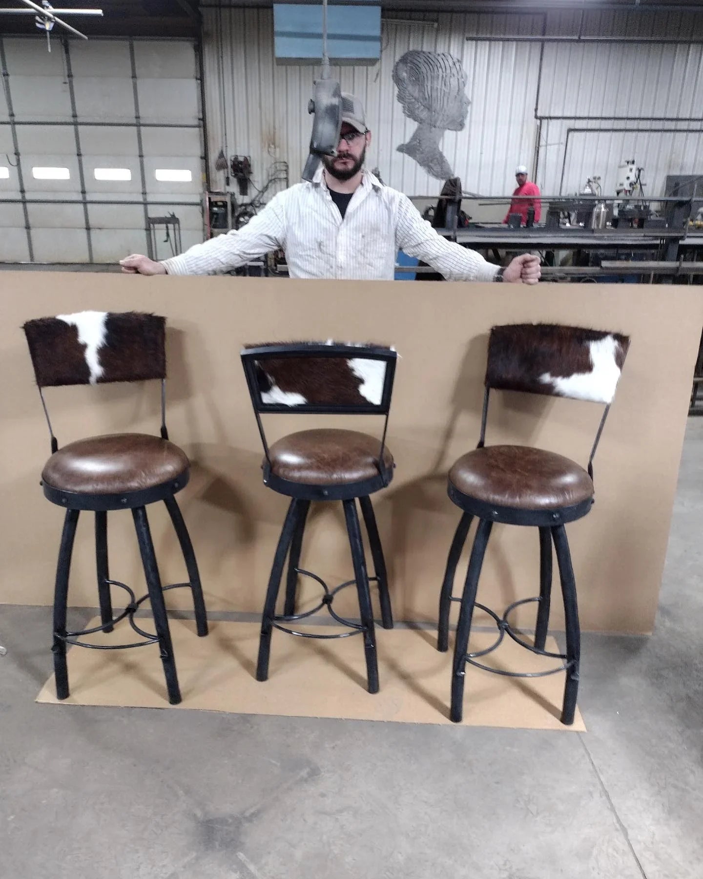 3 Peak 9 Iron bar chairs with cowhide and smooth leather upholstery