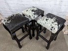genuine cowhide bar stools made in the USA with black frame 