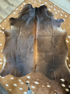 Saddleman's Brown Brazilian cowhide rug with natural tones premium hair on hide western decor