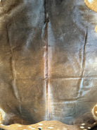 western brown cowhide rug organic shape for rustic and modern homes