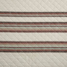 Textured fabric quilt with striped pattern on a neutral background - Your Western Decor