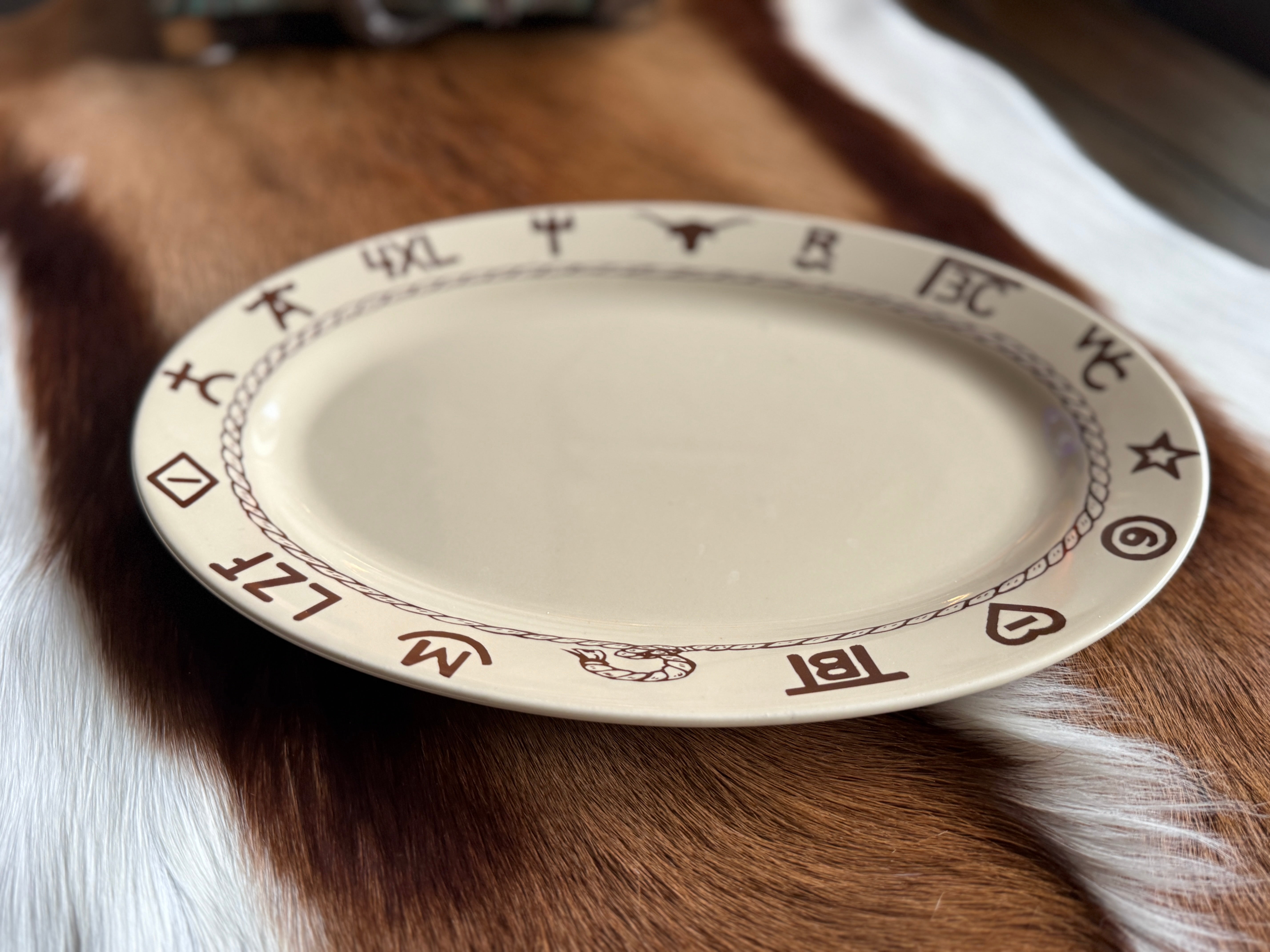 Ranch brands beige western steak house plate on Springbok hide