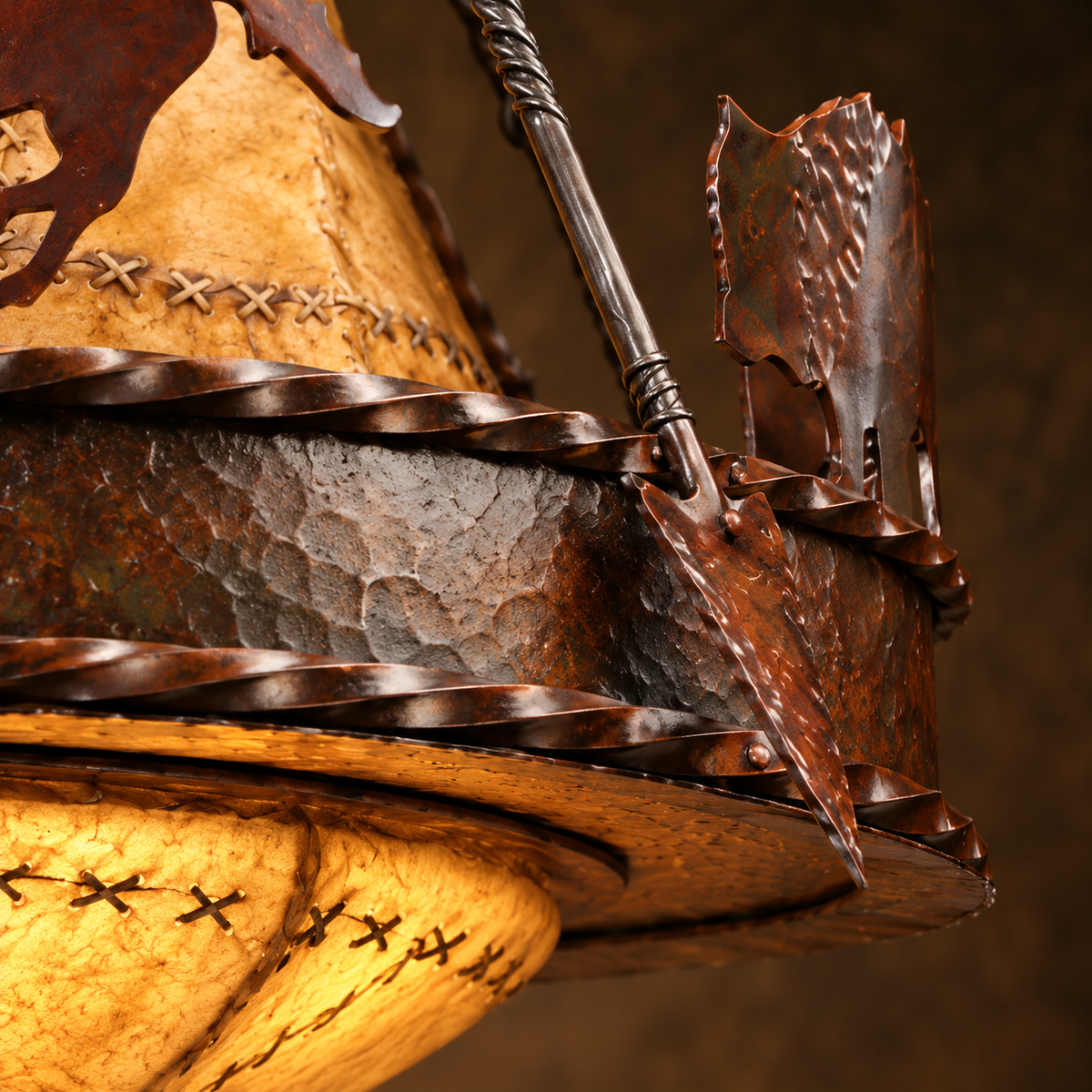 Detail of iron and rawhide custom made rustic chandelier 