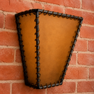 Rawhide and iron leather laced wall sconce handmade in Wyoming