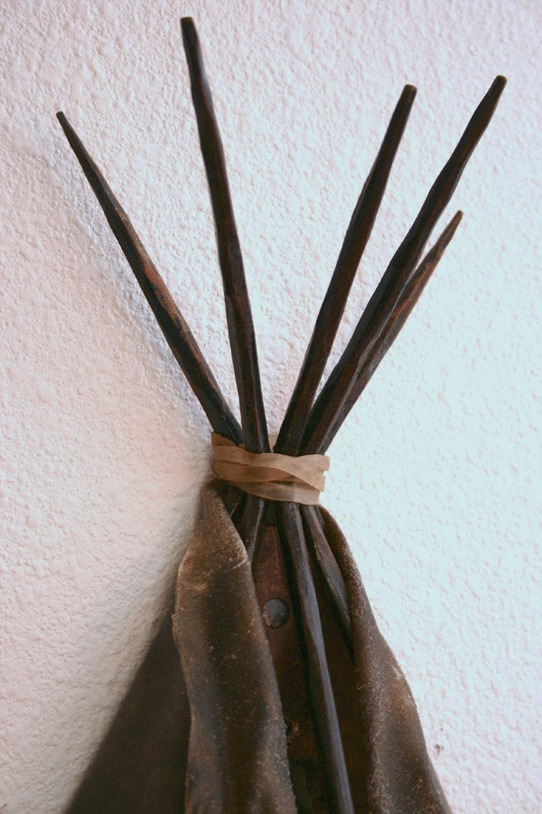 Detail of top of rawhide tipi wall sconce southwestern rustic wall lighting handmade USA
