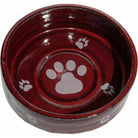 Red ceramic pet bowl with paw prints on a white background - Your Western Decor