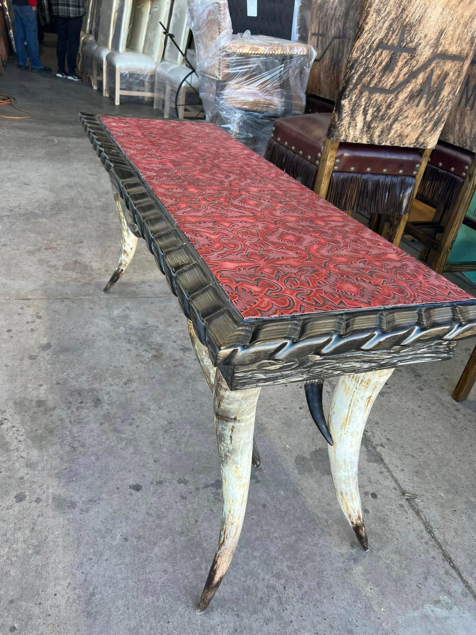 Longhorn leg Western entryway console table with red embossed leather made in the USA