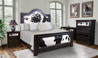 Distressed ebony bedroom set with black and white cowhide upholstery finished with nailhead trim - Your Western Decor