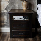 Regal Ebony nightstand with black white cowhide and nail trim