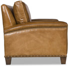 Remington western leather sofa with sloped arms, hand-sewn stitching, gimp  trim, and nailhead trim