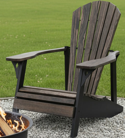 Wooden Adirondack chair on a gravel surface with a grassy background - Your Western Decor