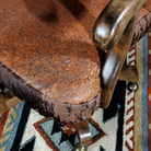 Detail of rough leather upholstery on western desk chair made in the USA - Your Western Decor