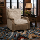 Rowan Ranch power recliner upholstered in premium leather and fabric with nailhead trim in a luxury western living room.