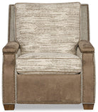 Patterned armchair with brown accents on a white background - Your Western Decor