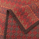 Front and back detail of Rushmore quilt in reds and browns